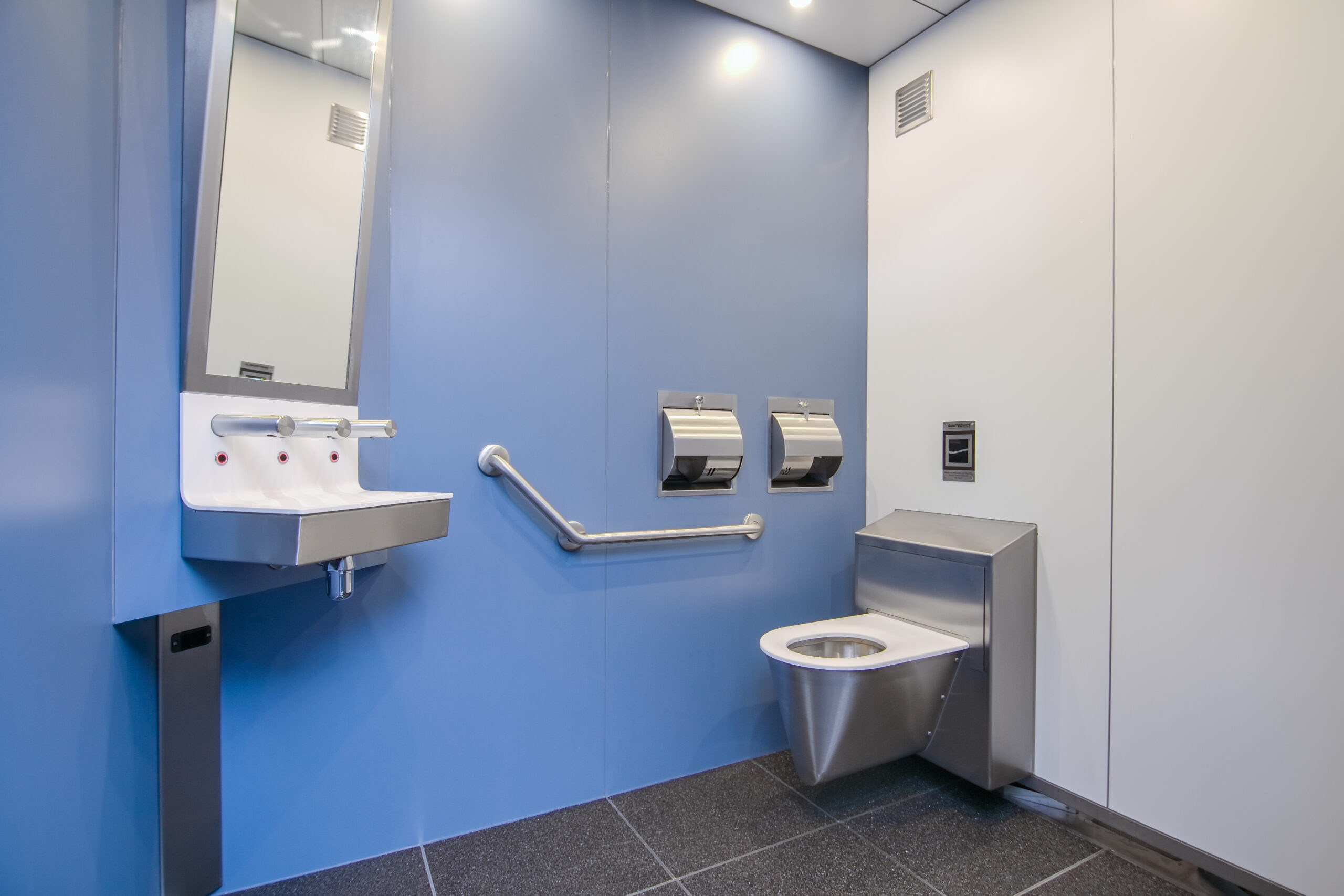 The Automatic public restroom unit with wood exterior